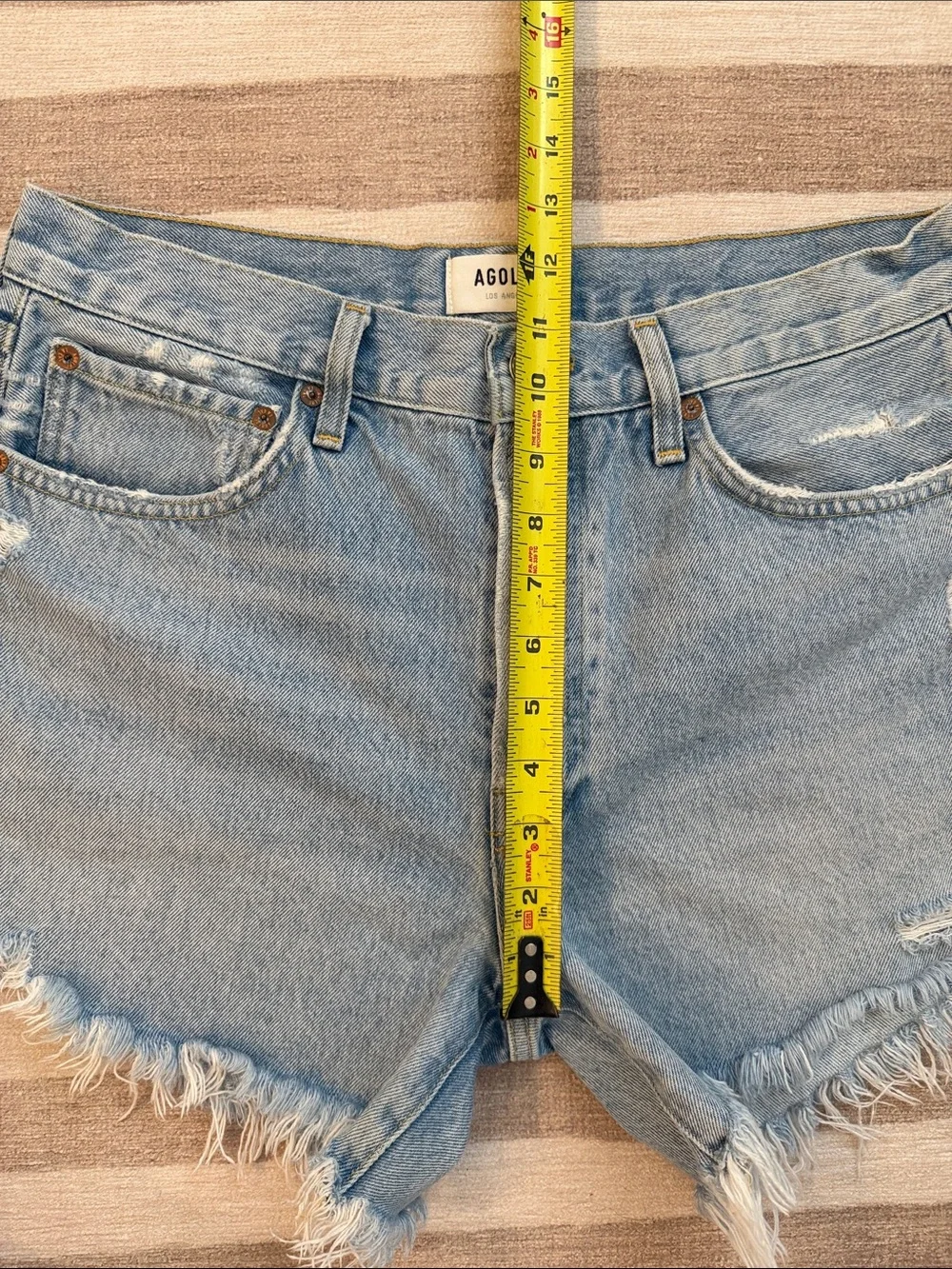 AGOLDE Medium Wash Frayed Hem Denim Cutoff Shorts